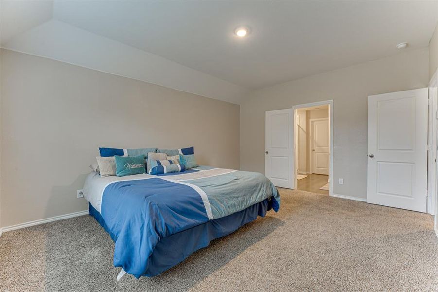 View of carpeted bedroom