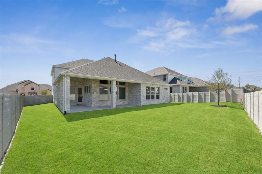 Exterior details and patio area of a home in Painted Tree Lakeside, McKinney (Image 2). Exterior details and patio area of a home in Painted Tree Lakeside, McKinney (Image 2).
