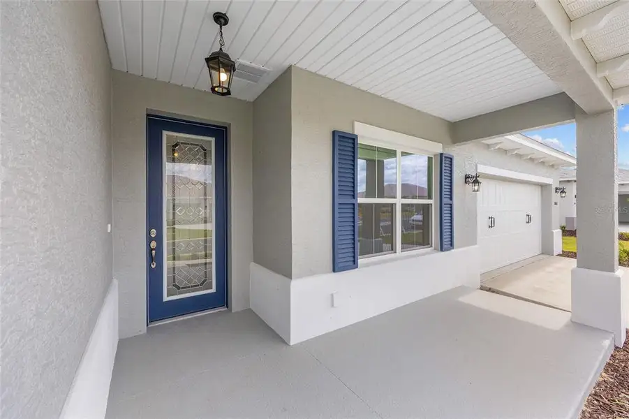 Exterior details and patio area of a home in , Ocala (Image 3).