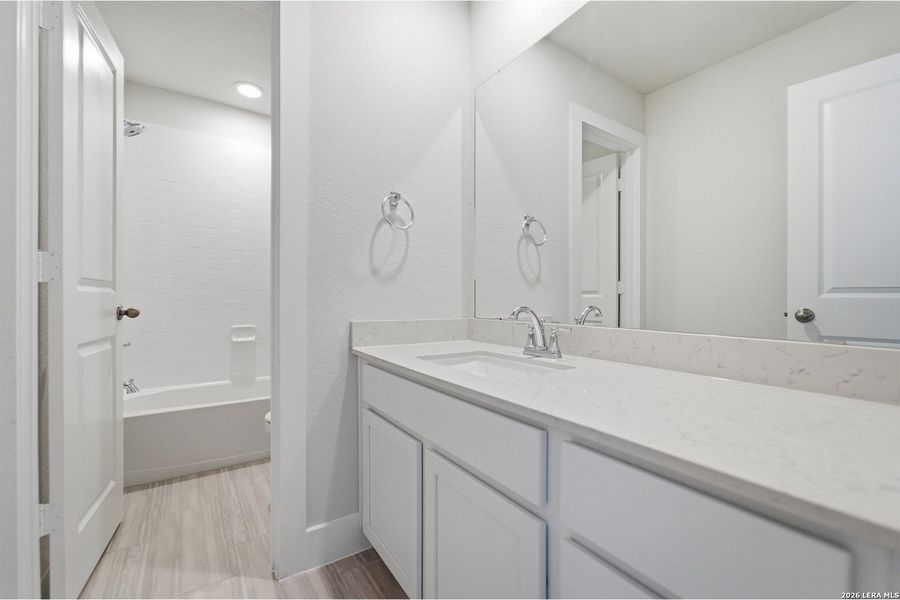 Furnished interior view inside a new home in Hickory Ridge, Elmendorf (Image 9).