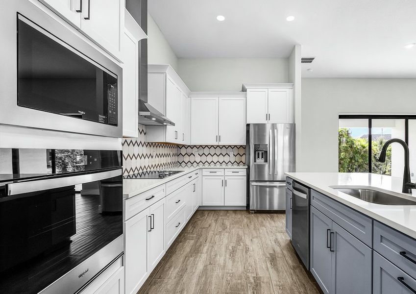 Stainless steel appliances are included.