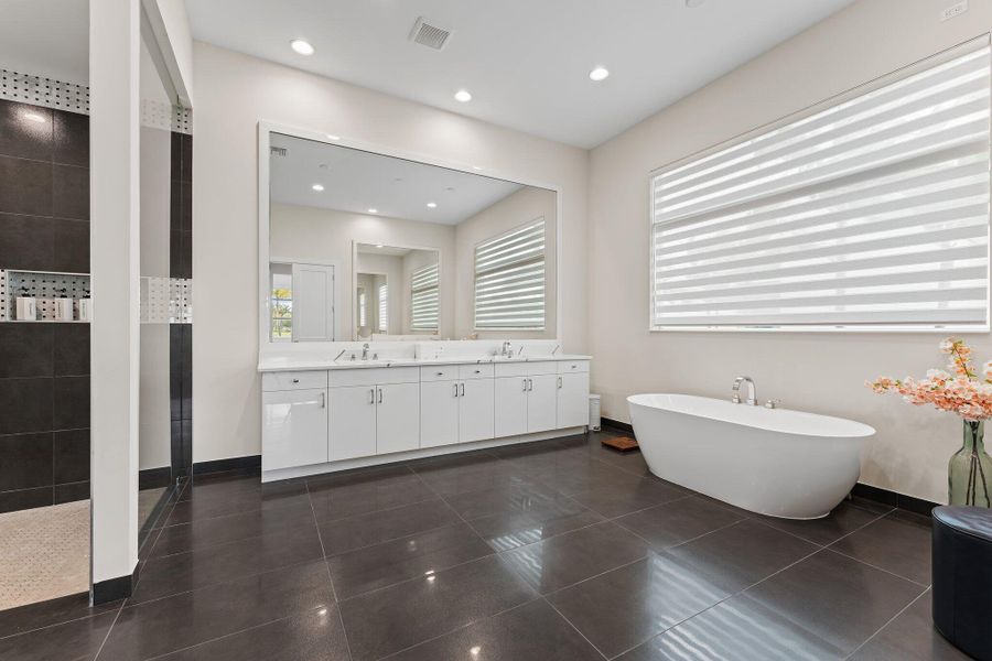 Furnished interior view inside a new home in Coral Isles at Avenir, Palm Beach Gardens (Image 28).