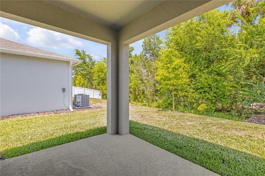 Exterior details and patio area of a home in , New Smyrna Beach (Image 4).