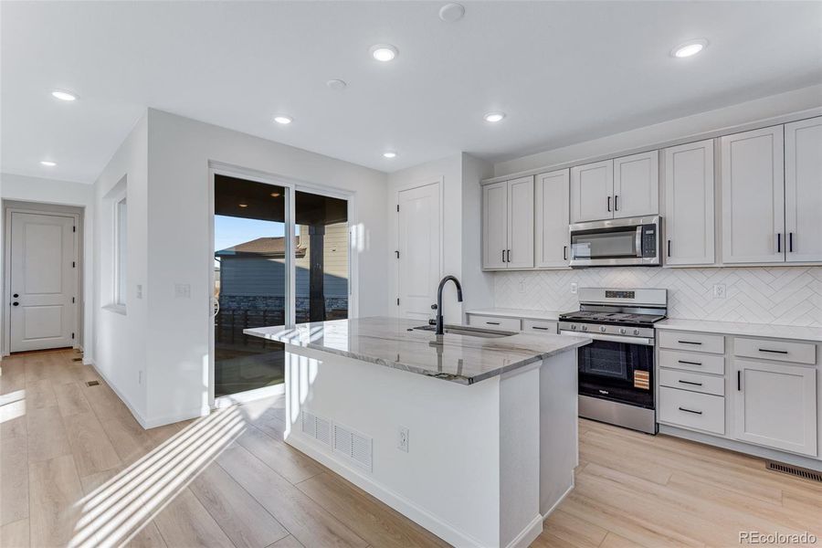 Furnished interior view inside a new home in Painted Prairie, Aurora (Image 10). Furnished interior view inside a new home in Painted Prairie, Aurora (Image 10).