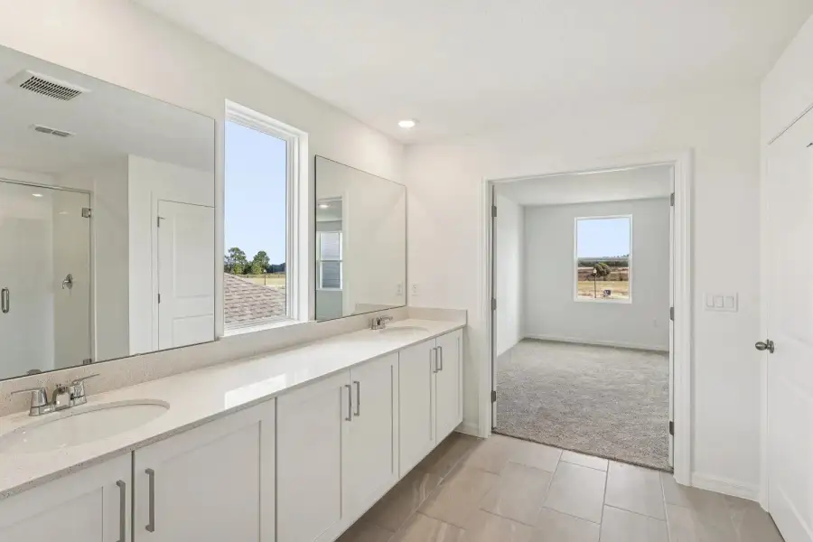 Furnished interior view inside a new home in Northlake at Ovation, Winter Garden (Image 13).