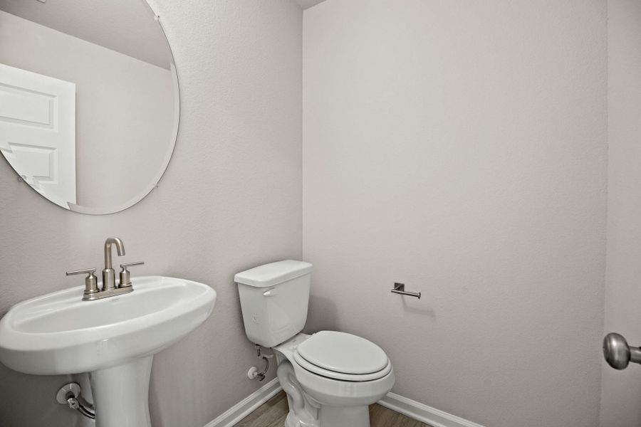 Half bath (*Photo not of actual home and used for illustration purposes only.) Half bath (*Photo not of actual home and used for illustration purposes only.)