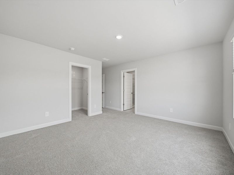 Spacious, unfurnished interior of a new home in Crossing at Abner Creek Townes, Greer (Image 17).