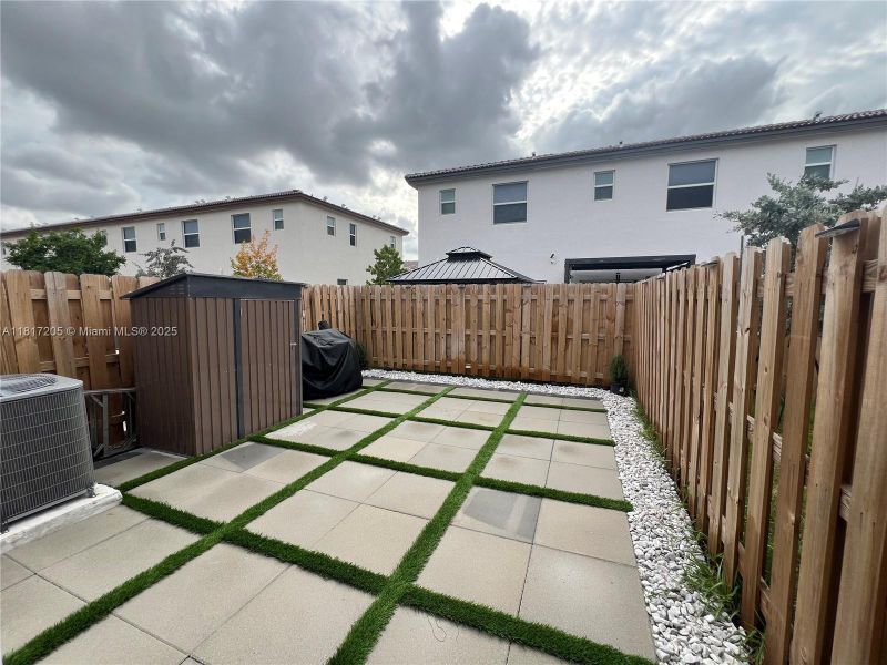Exterior details and patio area of a home in , North Miami (Image 1).