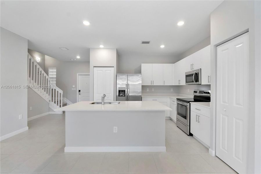 Furnished interior view inside a new home in , Coral Springs (Image 8).