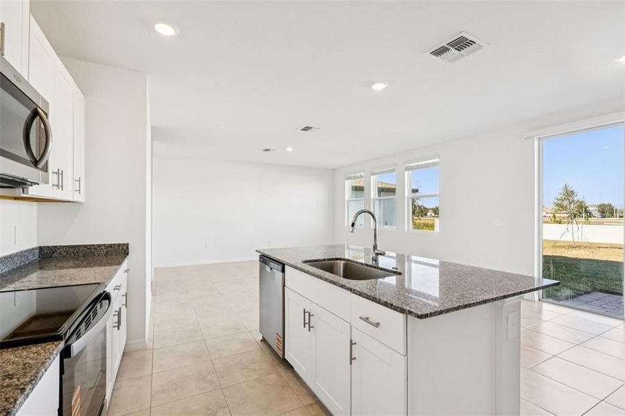 Furnished interior view inside a new home in , Poinciana (Image 9).