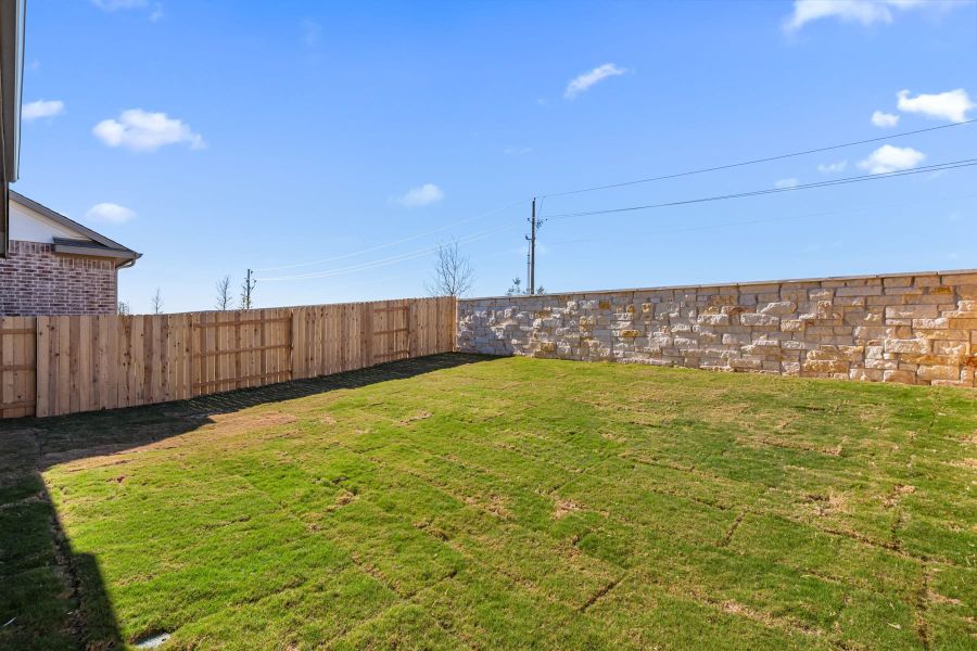 Exterior details and patio area of a home in Flora, Hutto (Image 27).