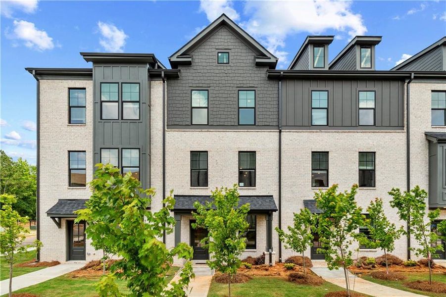 Front exterior of a new home in Silverock, McDonough, GA, highlighting curb appeal (Image 18).