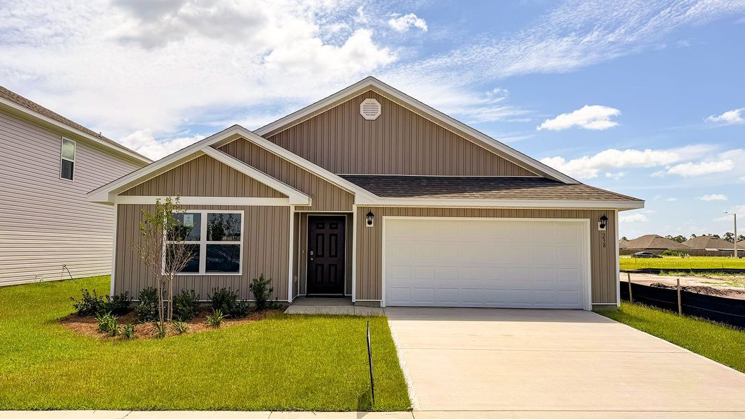 Front exterior of a new home in Park Place, Panama City, FL, highlighting curb appeal (Image 1). Front exterior of a new home in Park Place, Panama City, FL, highlighting curb appeal (Image 1).