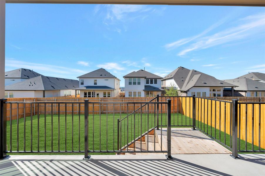 Exterior details and patio area of a home in Heritage, Dripping Springs (Image 23).