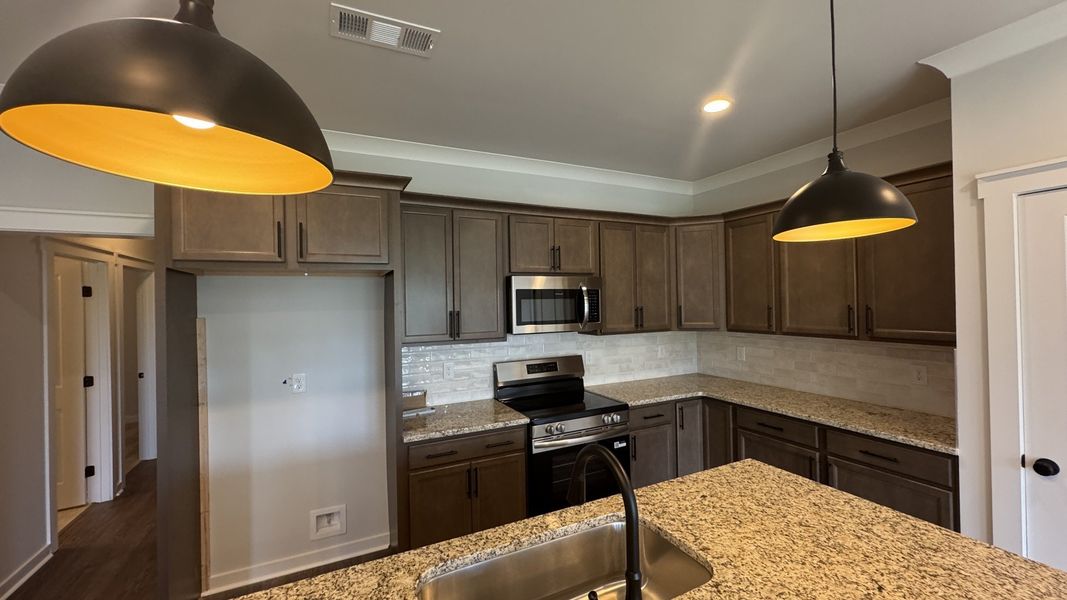 Furnished interior view inside a new home in The Greens at Legacy Townhomes, Springfield (Image 8).