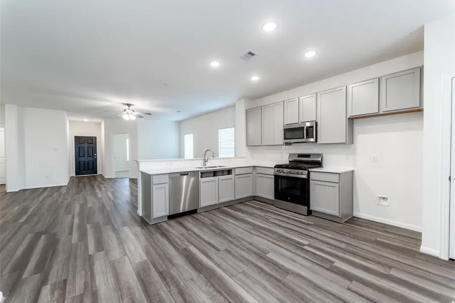 Furnished interior view inside a new home in Windrose Green, Angleton (Image 6).