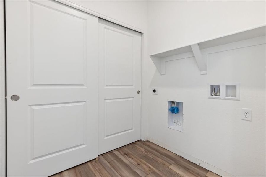 A white wall with white doors.