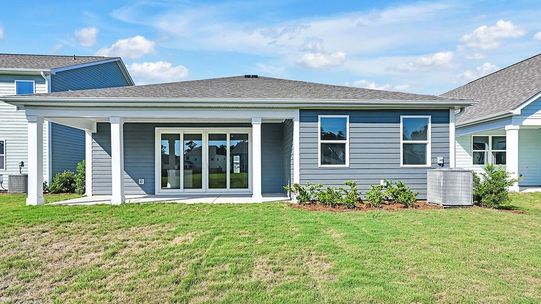 Exterior details and patio area of a home in The Haven at Indigo Preserve, Leland (Image 3).