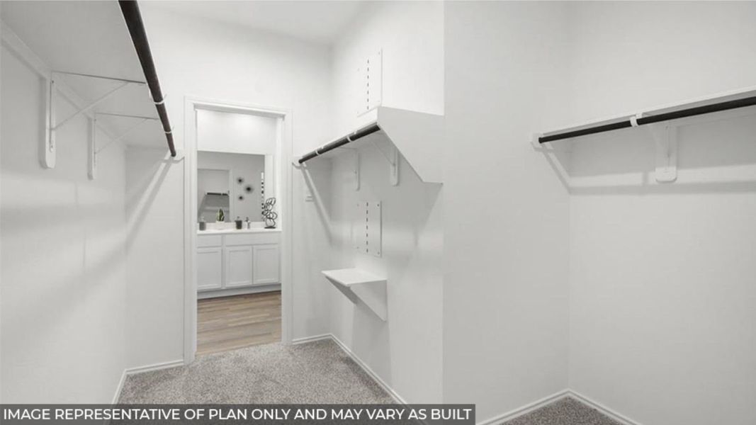 Furnished interior view inside a new home in Sunterra, Katy (Image 11).