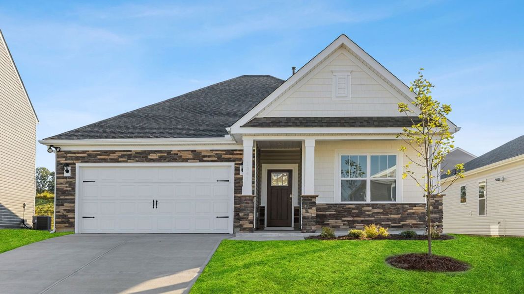 Front exterior of a new home in Sage Grove, Lyman, SC, highlighting curb appeal (Image 1).