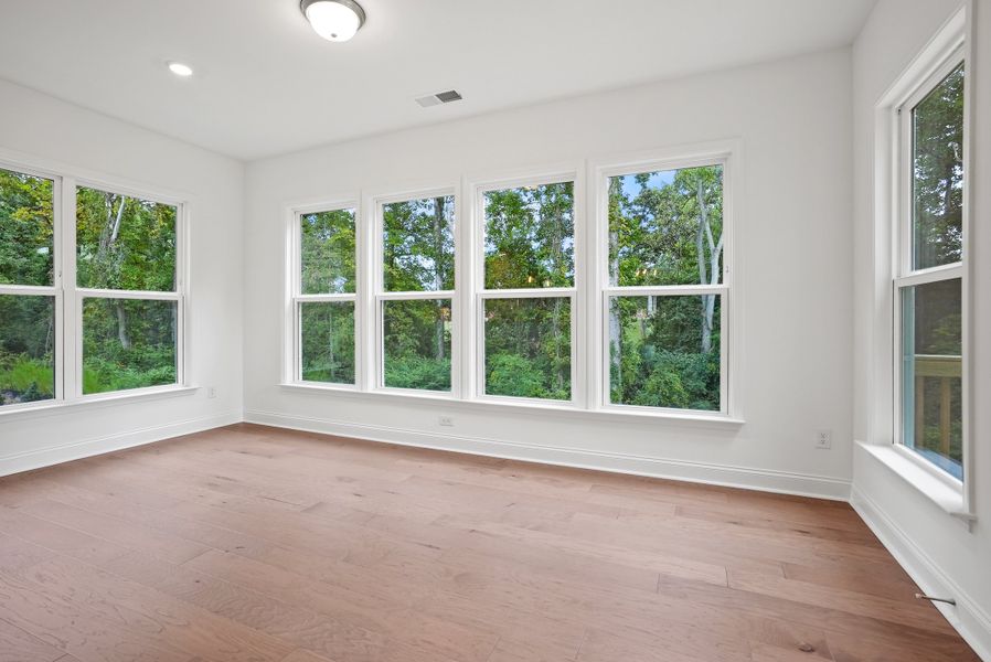 Sunroom off the kitchen and gathering room