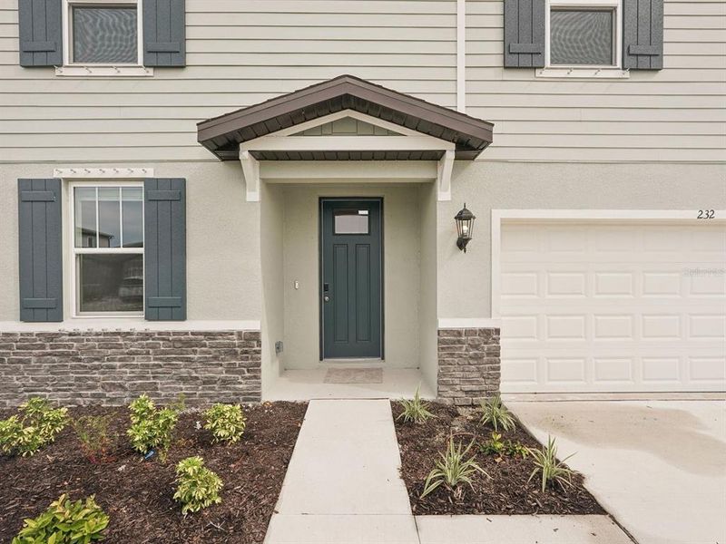 Exterior details and patio area of a home in Magnolia Bay - Classic Series, Nokomis (Image 18). Exterior details and patio area of a home in Magnolia Bay - Classic Series, Nokomis (Image 18).