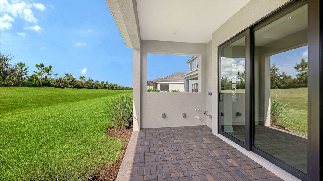 Exterior details and patio area of a home in Palm Grove Real Estate and Homes for Sale in Lakewood Ranch, FL - Neal Communities, Lakewood Ranch (Image 25). Exterior details and patio area of a home in Palm Grove Real Estate and Homes for Sale in Lakewood Ranch, FL - Neal Communities, Lakewood Ranch (Image 25).