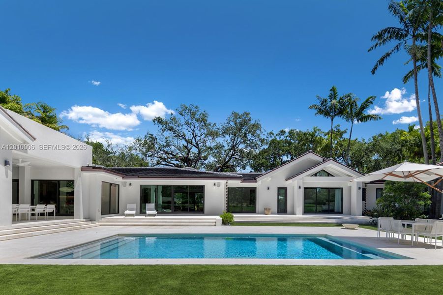 Exterior details and patio area of a home in , Coral Gables (Image 28).