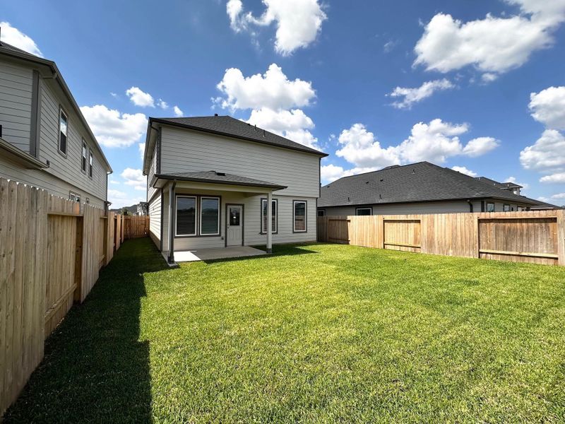 Exterior details and patio area of a home in , Houston (Image 12). Exterior details and patio area of a home in , Houston (Image 12).