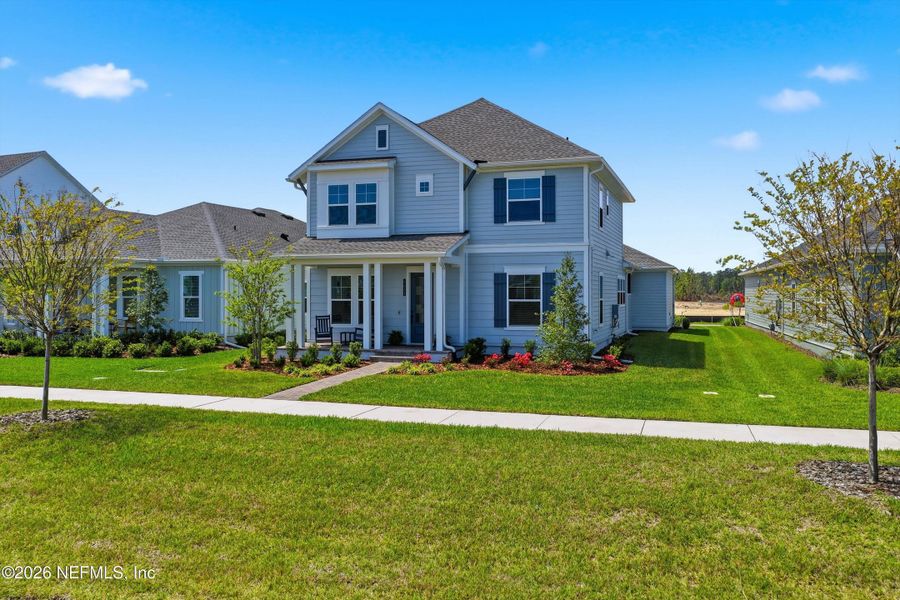 Front exterior of a new home in Seven Pines 50' Rear Entry, Jacksonville, FL, highlighting curb appeal (Image 26).