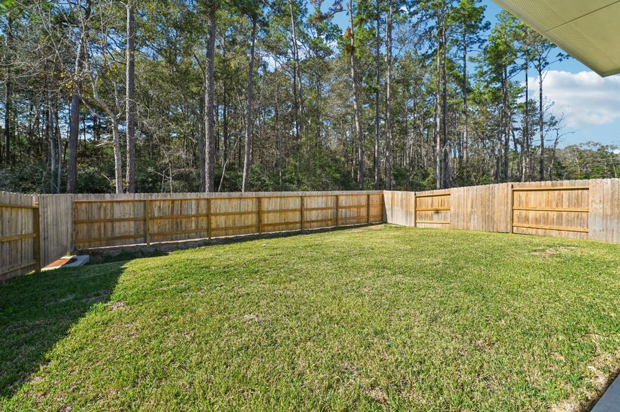 Exterior details and patio area of a home in , New Caney (Image 4).