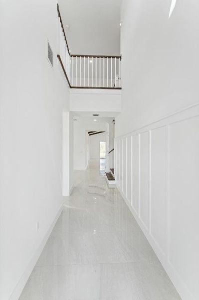 Foyer with Volume Ceiling