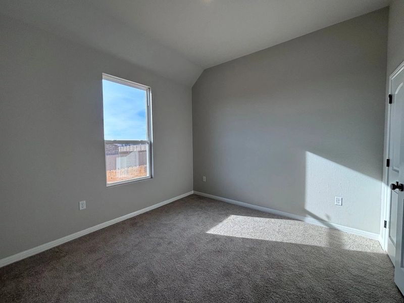 Spacious, unfurnished interior of a new home in The Colony, Bastrop (Image 14).