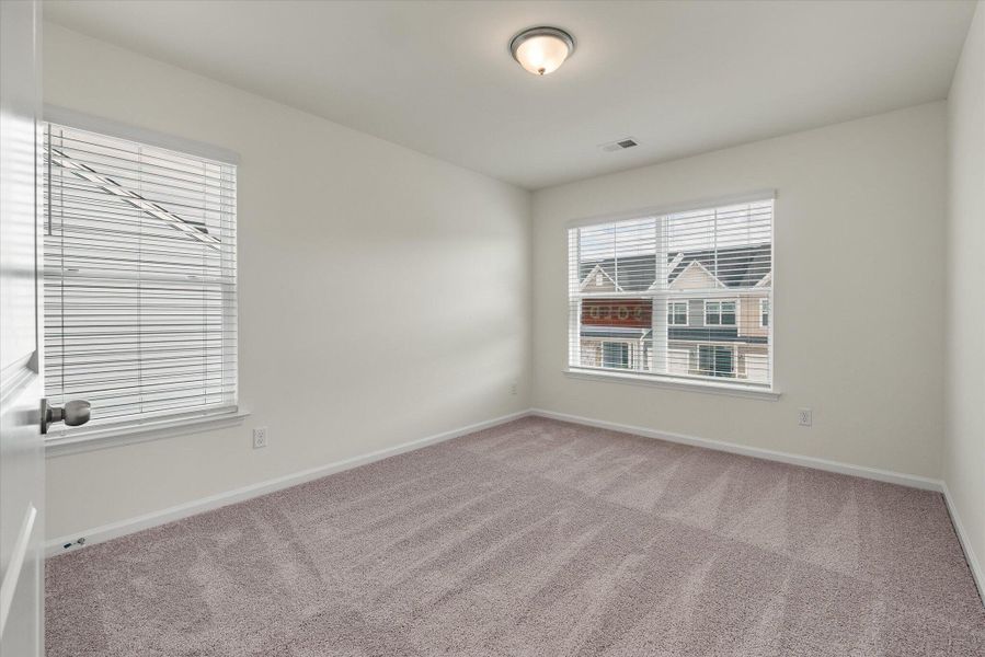 Spacious, unfurnished interior of a new home in The Landings at Montague, Goose Creek (Image 22).