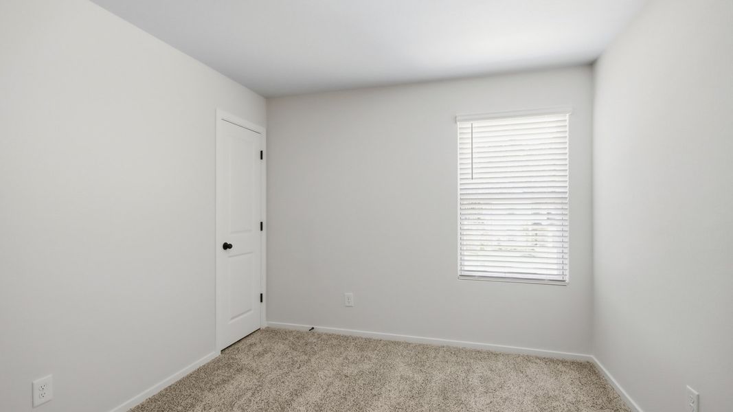 Representative unfurnished interior of a home built from the Perry by D.R. Horton in New Waverly Station, New Waverly (Image 21).