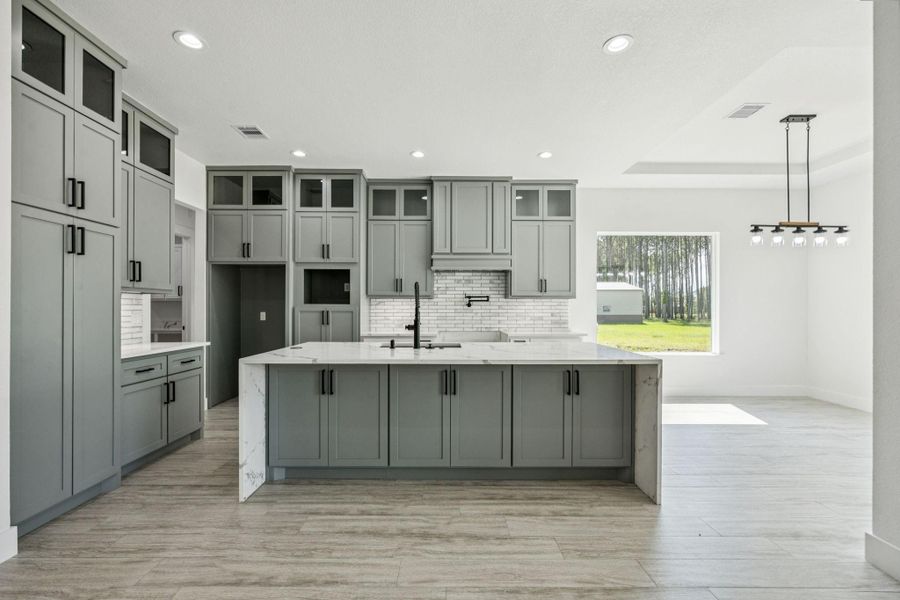 You will not be short of space here! The floor to ceiling cabinets is perfect for those who love to spend time creating memories in the kitchen. Note that even the island has storage! You will not be short of space here! The floor to ceiling cabinets is perfect for those who love to spend time creating memories in the kitchen. Note that even the island has storage!