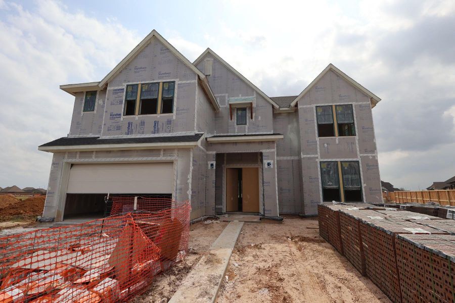 In-progress construction of a new home in Dunham Pointe, Cypress, TX (Image 11).