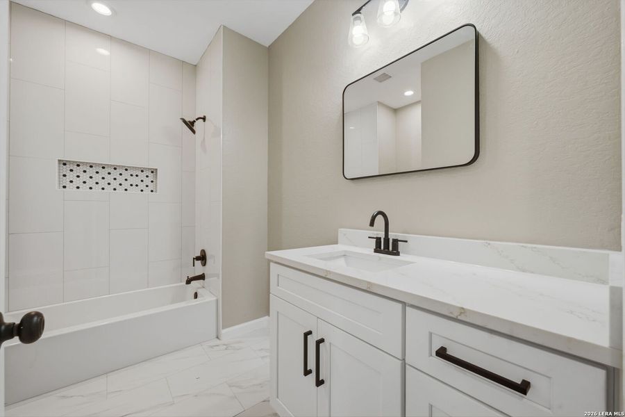 Furnished interior view inside a new home in , Devine (Image 18).