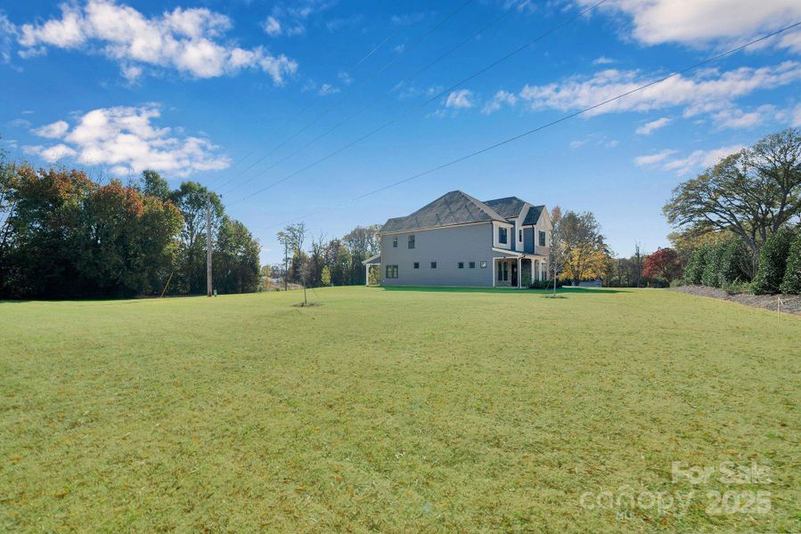 Exterior details and patio area of a home in Whitaker Pointe, Huntersville (Image 4).