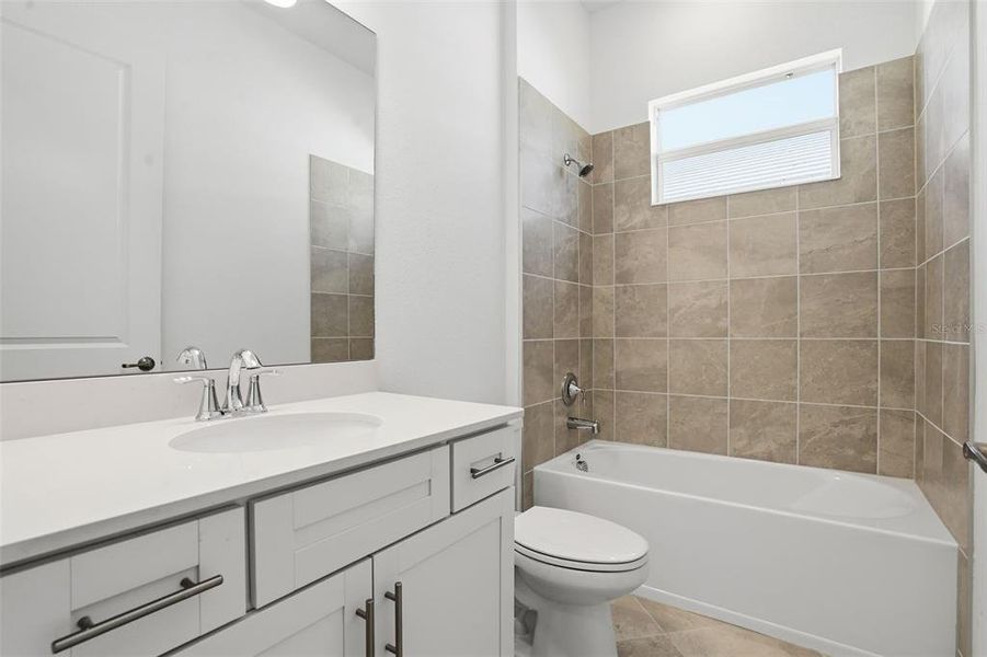 Furnished interior view inside a new home in Wellen Park Golf & Country Club, Venice (Image 9).