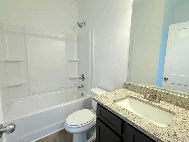 Furnished interior view inside a new home in Westlyn, Winder (Image 5).