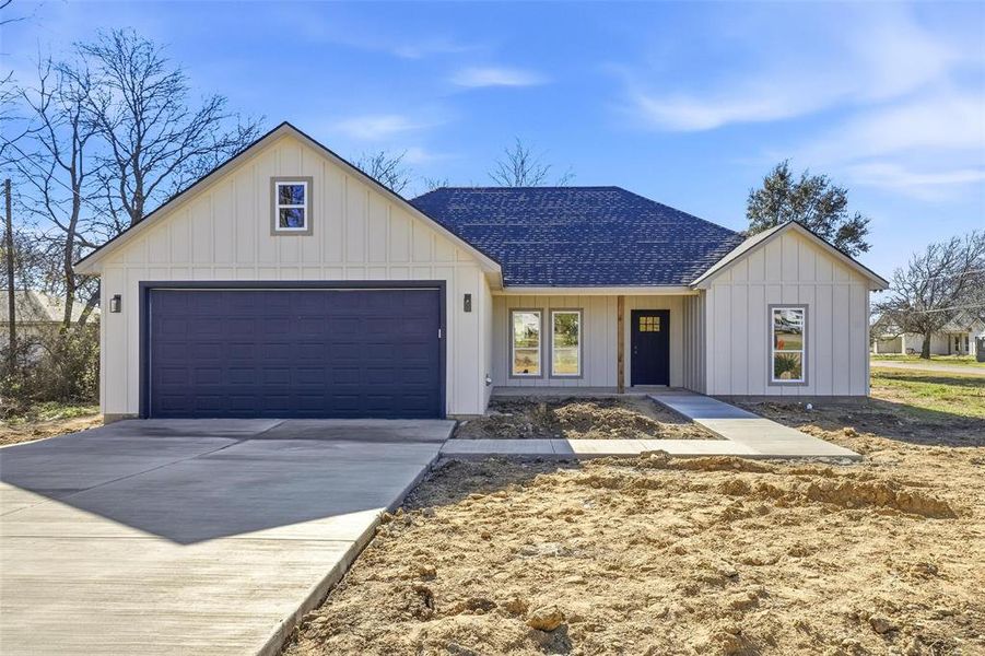 Front exterior of a new home in , Whitney, TX, highlighting curb appeal (Image 1). Front exterior of a new home in , Whitney, TX, highlighting curb appeal (Image 1).
