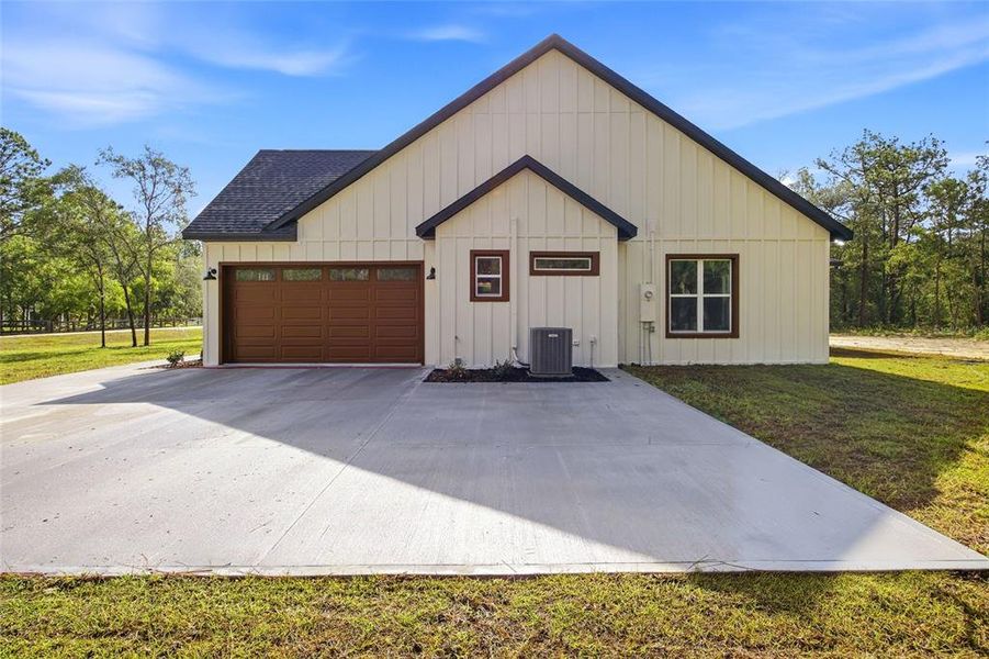 Front exterior of a new home in , Dunnellon, FL, highlighting curb appeal (Image 23). Front exterior of a new home in , Dunnellon, FL, highlighting curb appeal (Image 23).