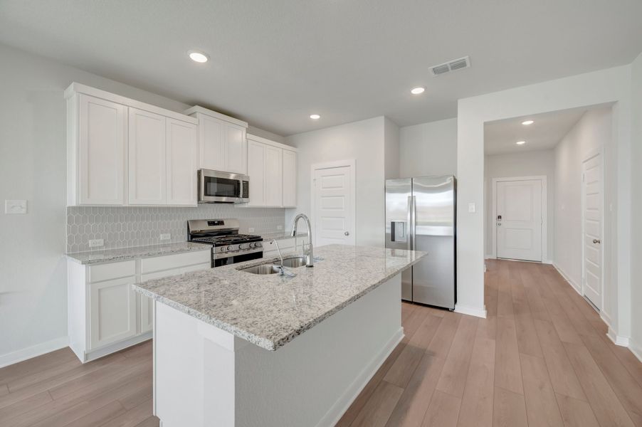 Furnished interior view inside a new home in Mason Woods, Cypress (Image 6).