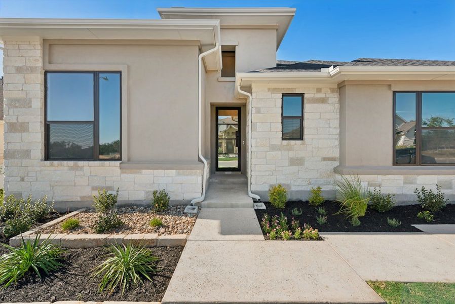 Exterior details and patio area of a home in Riverstone, Georgetown (Image 3).