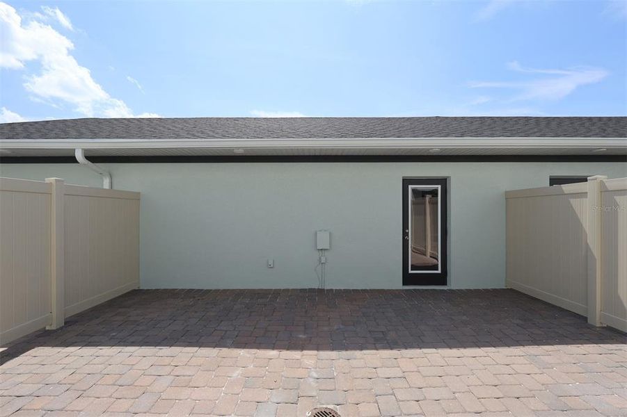Exterior details and patio area of a home in Center Lake on the Park, St. Cloud (Image 3).