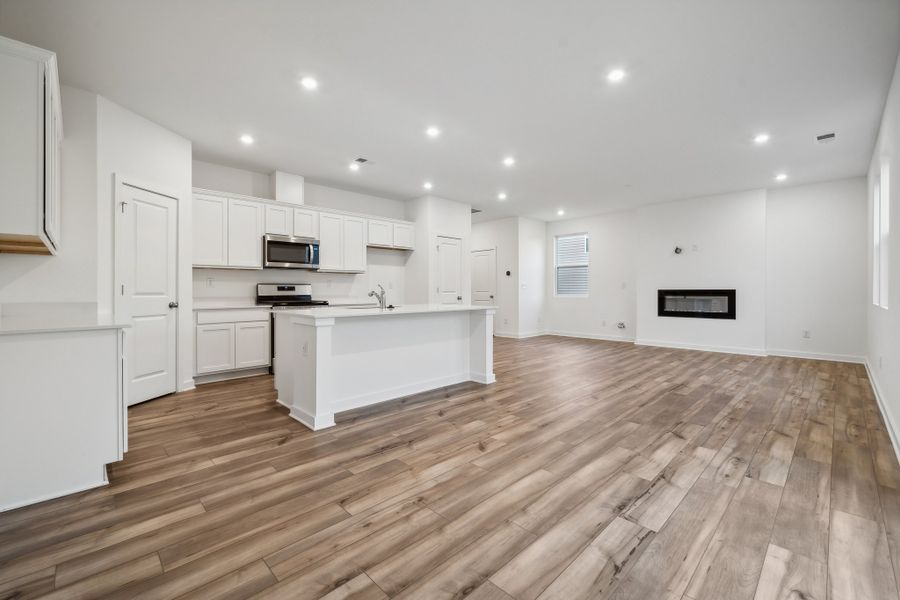 A kitchen with white cabinets. A kitchen with white cabinets.