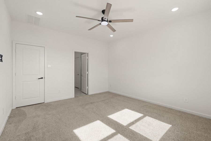 Come and unwind after a long day in this primary suite! This spacious room features an ensuite bathroom!