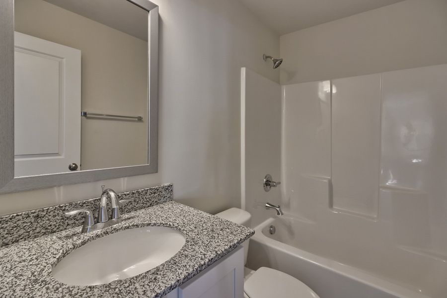 Representative furnished interior of a home built from the Dogwood A by McGuinn Homes in Reserves at Mill Creek, Columbia (Image 17).