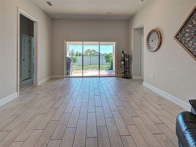 Spacious, unfurnished interior of a new home in Watercress Cove, North Port (Image 22).